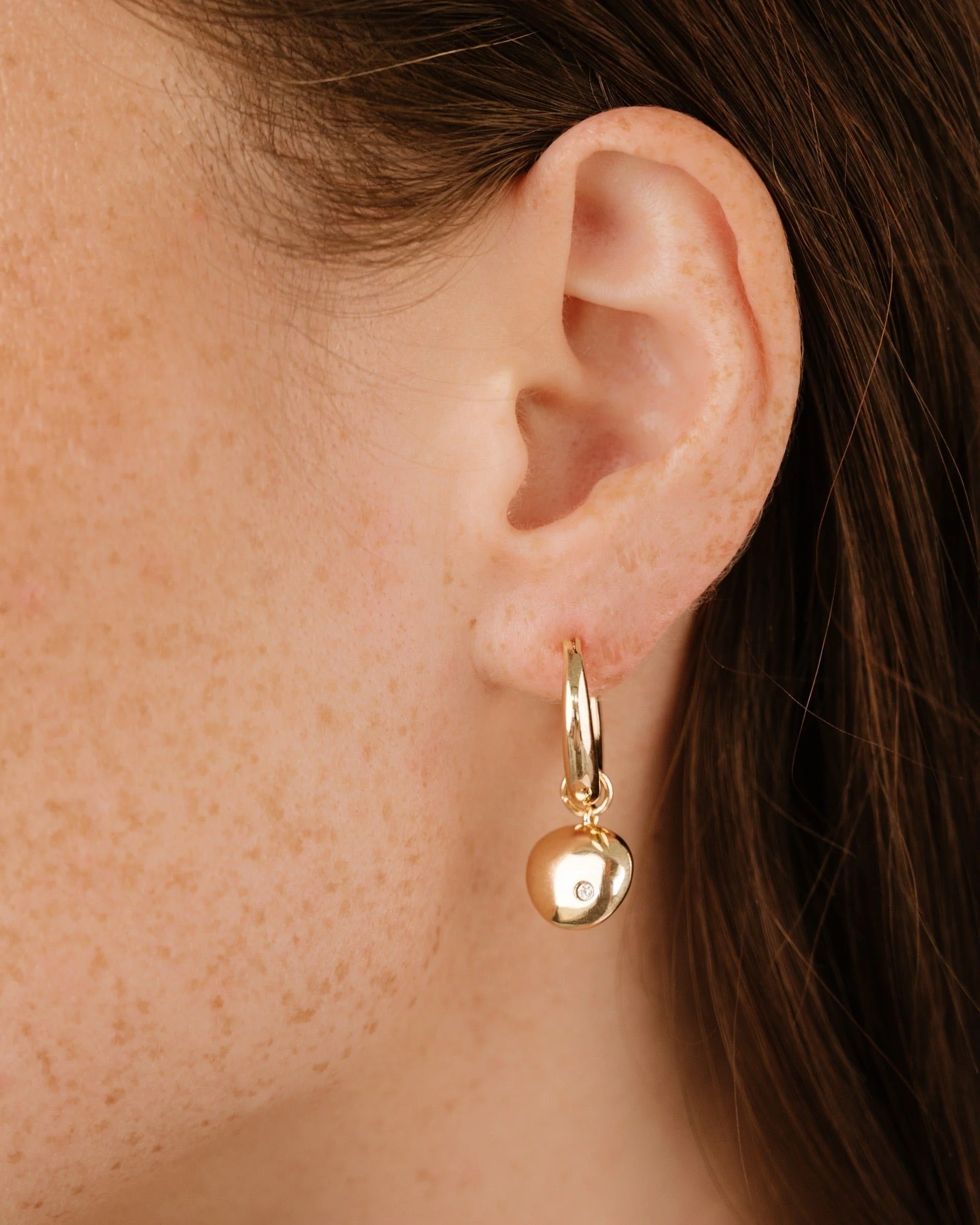 Polished Pebble Huggie Hoop Earrings - Image 2